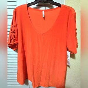 Passport Vibrant Orange Short Sleeve Top